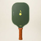 Green pickleball paddle with brown handle on a beige background
