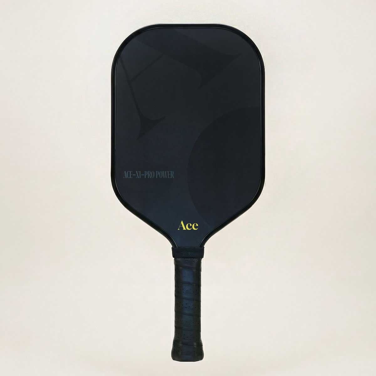 Black pickleball paddle with 'Ace' branding on a beige background